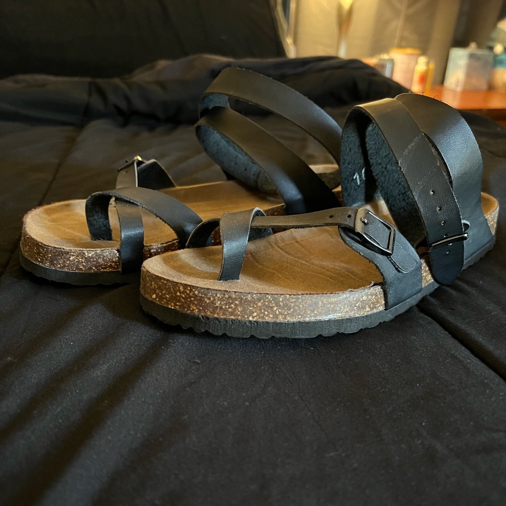 Black strappy sandals.
